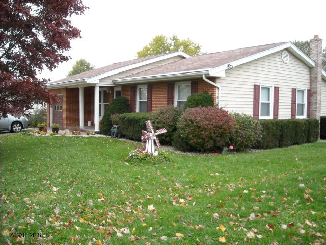 Beautiful 3 BR, 1.75 bath 1 story home in Logan Township with and additional 29 x 120 lot included (1.10-17-35) in the city, on one deed.  Combined frontage of 109'.  Oak kitchen combo with sliding doors that leads to a large deck in rear.  The lot itself is level and the 1 car integral garage presently has a wheelchair ramp that is removable.  Full basement with a FR with a woodstove, a really large recreation room, and a large laundry room with storage.  Plenty of parking! Central air and electronic air filter, and humidifier on efficient heat-pump system. Approximately 1300 Square foot above grade with garage and full basement. It's best to see if you're interested - priced right/very nice...  Low Gas Costs: $30-$65/month; Electric: $60-$120./month depending on time of year.