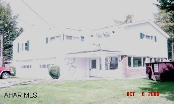 Well maintained - one owner raised ranch. 2 car garage, 3 season porch, 2 sheds, nice lot. Extra bonus room, ice melt system for roof & back up generator system.