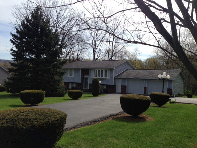 Lovely home on nearly 1 acre.  Beautiful country set, yet close to town.  2 bedrooms, 2 bathrooms.  Full, finished basement.  Storage shed included.