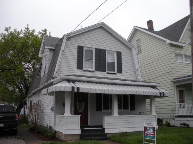Great location in East End, 2-3 bedroom home on nice lot with off street parking.  Main floor has a front living room, eat in kitchen with appliances included, large family room with gas fireplace and patio doors that lead to a rear covered patio and fenced yard.  The second level has 2 bedroom plus a bonus area that could be used for an additional bedroom.  This home has 100 amp breaker service and newer water heater.