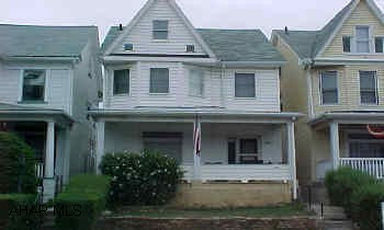 Larger than it looks.  Home offers 4 BR, 2 BA, newer windows, newer roof.  Updated electrical.  Attic offers additional two heated rooms.