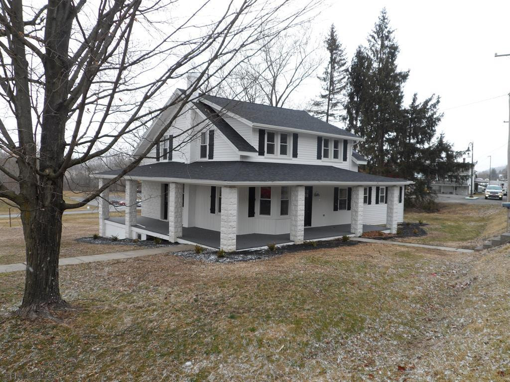 Beautiful & Charming - 4 Bed 3 Bath home that has been totally remodeled inside & out!  New siding, roof, windows, kitchen & baths and more.  All you have to do is move in this country charmer and enjoy!  There is also a large wrap around porch which adds more charm to this home!