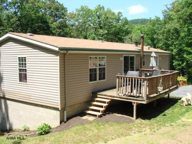 Lovely country setting close to town and easy access to I-99. Convenient one level living with the possiblility of finishing the basement for additional living space. Large master bedroom and bathroom, kitchen has a nice workable floor plan with eating at the counter as well as a dining area. French doors accent the basement and a deck for entertaining or enjoying nature.