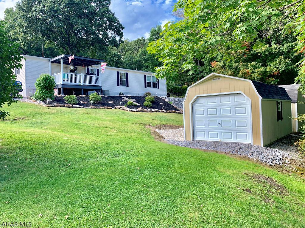 Well maintained move in ready double-wide home built in 2014. This home offers 3 bedrooms, 2 baths, living room and family room, open floor plan, large kitchen with hickory cabinets, insulated windows, kitchen appliances, two sheds, and much more. Located not far from Lake Raystown. Call today to setup a showing!