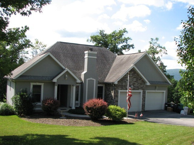 Ranch home with daylight walk-out lower level.
