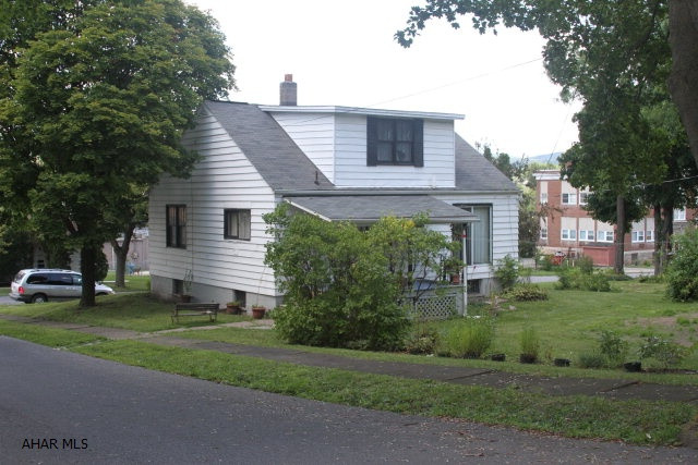 Lots of opportunity - 2 vacant lots go with this property for lots of space in the city.  Close to local amenities and Highland Park.  This property needs a rehabilitation inside and out so you can put your personal touch on it.  Agent is related to the Executor of the Estate