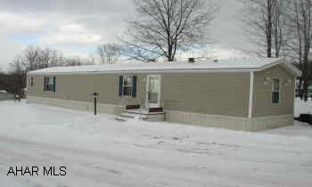 VERY NICE 14X72 CHAMPION SINGLEWIDE.  NEW DECK, NEW SPOUTING.  LOT RENT $240.  PRICED TO SELL.