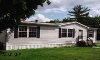 Champion doublewide on rented lot. Lot rent #180.00 month, home is 44' X 27' very clean, shed, 3 bedrooms, living room, dining room, 2 baths.
