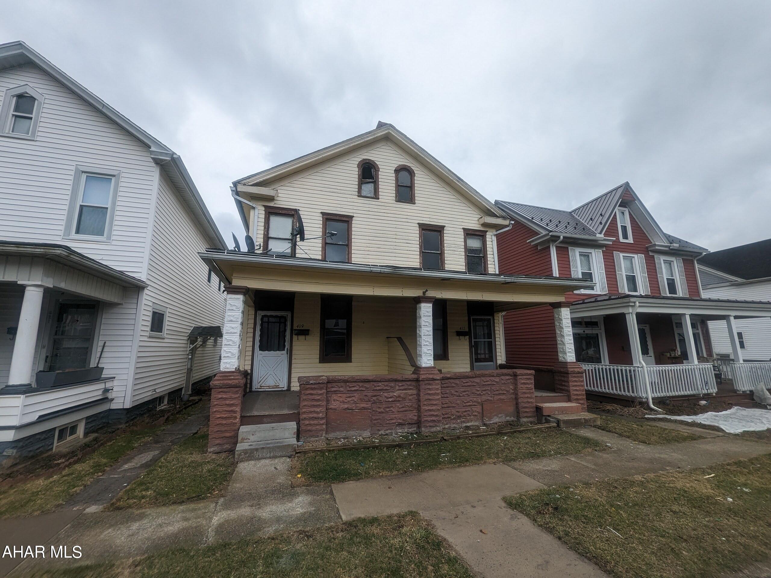 Bellwood Borough side-by-side double house. Great neighborhood close to everything! Great investment opportunity. This property is in disrepair and needs significant updates and repairs. AS-IS sale. Seller will make no repairs.