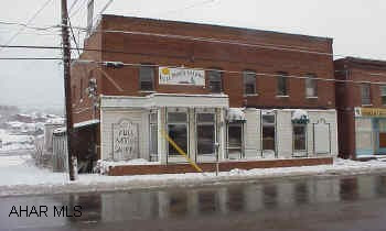 former full moon saloon. partially remodeled building, no liquor license.  second floor apartment.