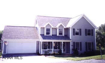 MUCH LARGER THAN IT APPEARS. 4 BEDROOMS  ON 2ND FLOOR. EXTRA GARAGE (1 STALL) IN BASEMENT FOR STORAGE.