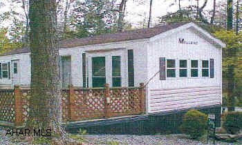 Great park model camper with up grades on deeded lot with utilities. Gated community, call  listing agent.