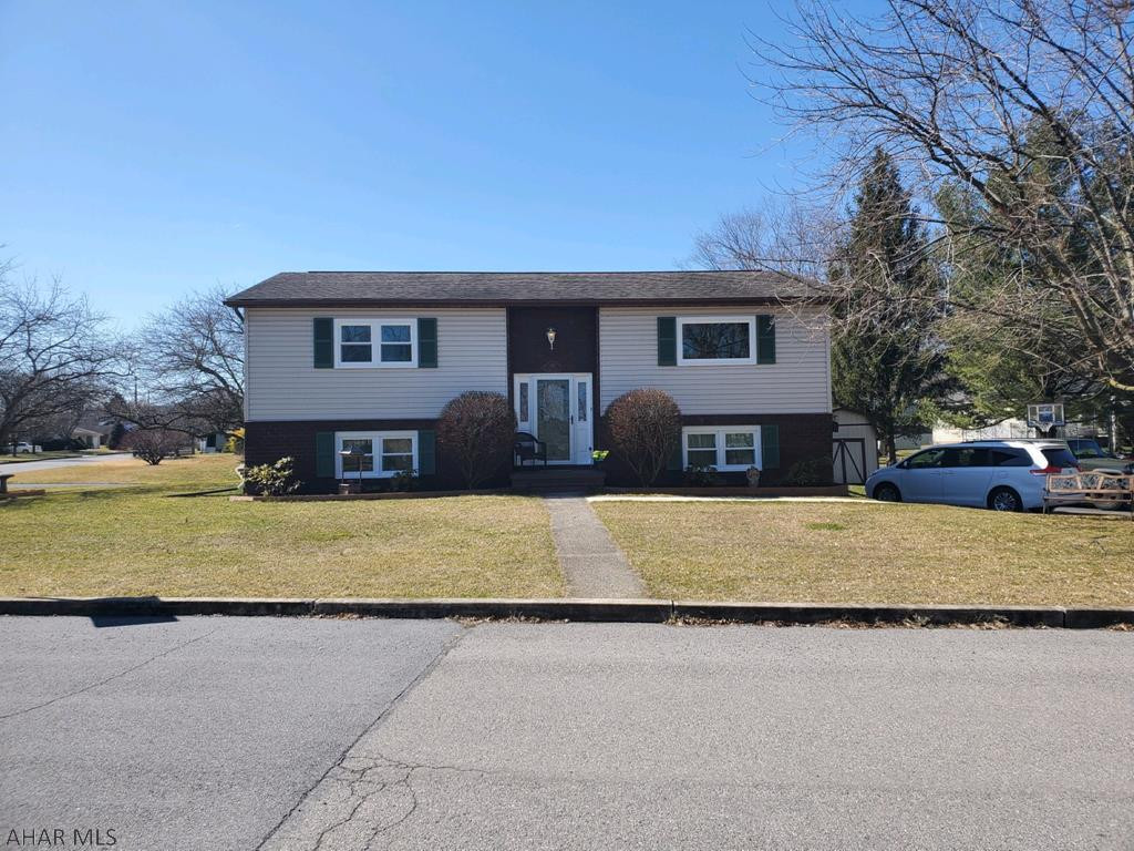Step into this beautiful Bi-Level Home located across from Duncansville Community Park. The main level of this home features an open concept living room, dining room and kitchen, 2 spacious bedrooms and a recently updated full bath. The lower level has 2 additional bedrooms (the room being used as the master bedroom was previously a family room that could easily be reverted back) and 3/4 bath and a laundry area. Enjoy open concept entertaining or step out to the enclosed back deck. Never get wet with the integral garage. New sidewalk. New garage door. New triple-pane krypton windows. So many upgrades. With a full-price offer, seller will provide up a 1 year Home Warranty. Schedule your tour today.
