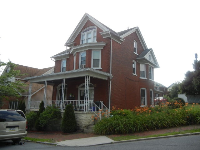 Classic Brick 2 1/2 Story in the city.  3 Bedrooms and 1 Bathroom.  Front and Back Covered Porch.  Off Street Parking.  A Home with Character.  A Must See! Newer furnace and gas lines.  Only $64,900.