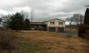 sold "as is" buyer must pay both (2%) transfer taxes.  See listing agent for addendum.  Property is located in Petersburg, zip code 16669.  Private setting. 2 car attached garage. Home needs some TLC.  Inground pool needs liner.