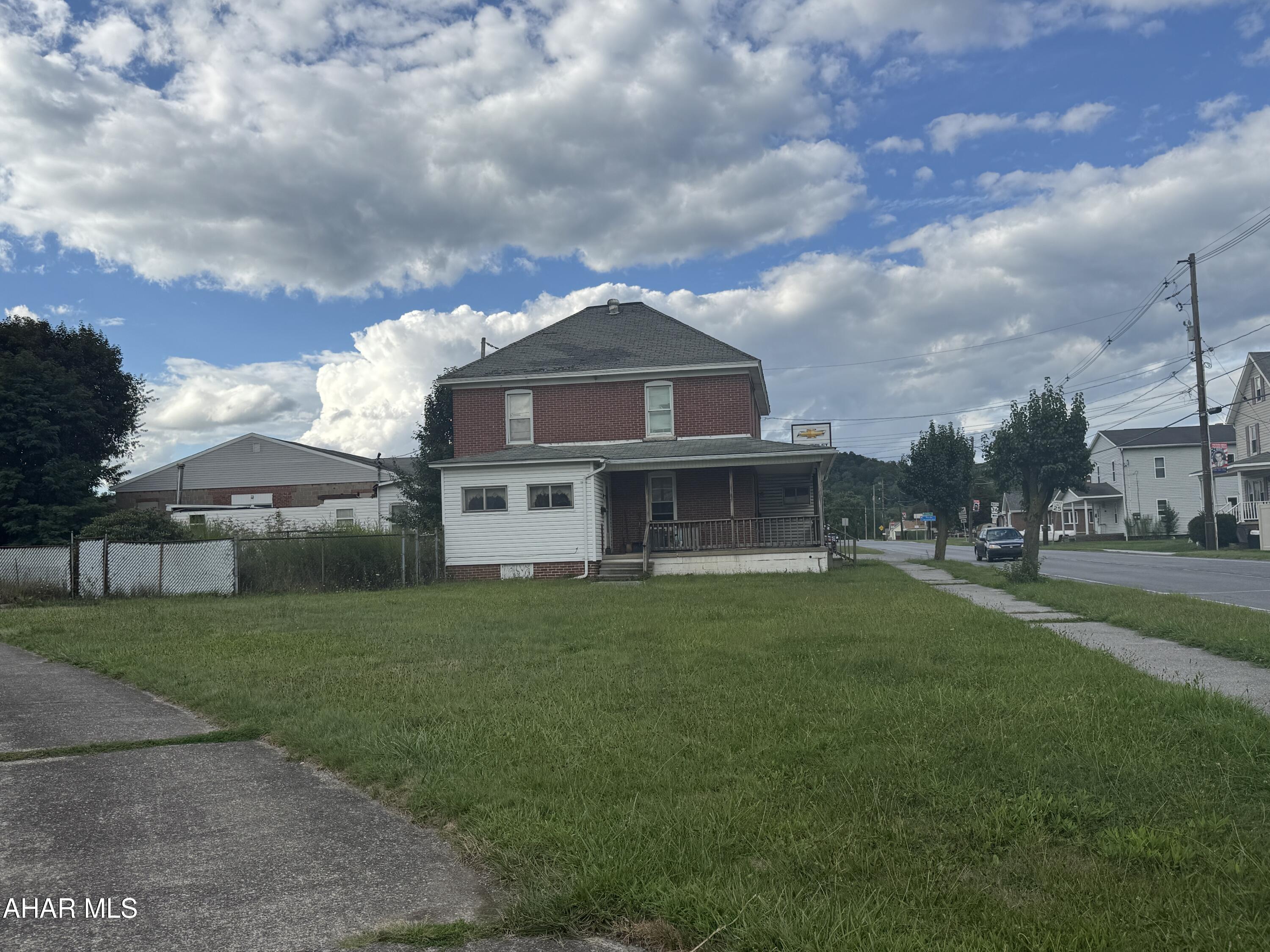 Two story brick set up as a duplex. Handy man special. Roof leaking - dwelling needs rehabed.  Interior inspection at your own risk only with agent.