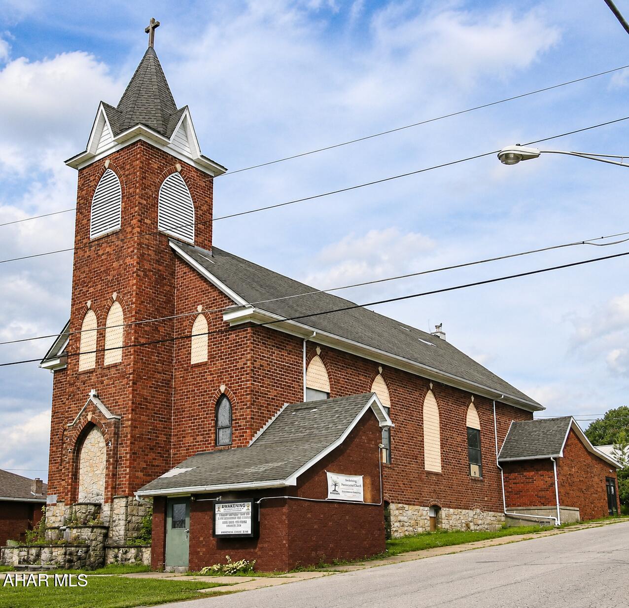 This former church offers a unique opportunity to transform a distinctive space into something truly special. With soaring ceilings and an open layout, the property provides a blank canvas for a wide range of potential uses. Similar buildings have been successfully converted into apartments, restaurants, breweries, event venues, studios, and other creative spaces.

The building is in need of extensive rehabilitation and currently has no active utilities, making it an ideal project for investors, developers, or anyone looking to bring a creative vision to life. The possibilities are endless for those ready to take on a rewarding renovation project.

Buyer is responsible for verifying permitted uses, zoning regulations, and all necessary approvals with the appropriate local authorities.