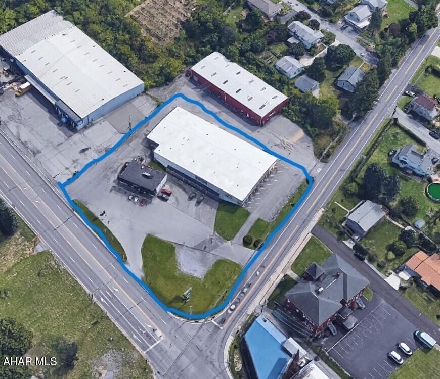 Corner commercial property featuring two well-maintained buildings in a high-visibility location with excellent road frontage and easy access. The property includes a successful Subway restaurant as an established tenant, providing steady traffic and income potential. Ample parking, strong exposure, and flexible commercial space make this an ideal investment or owner-user opportunity. Positioned on a prominent corner lot with strong daily traffic counts, this property offers excellent potential for retail, office, or mixed commercial use. Lower level is 50% remodeled. Main building includes a nice move in ready office space.