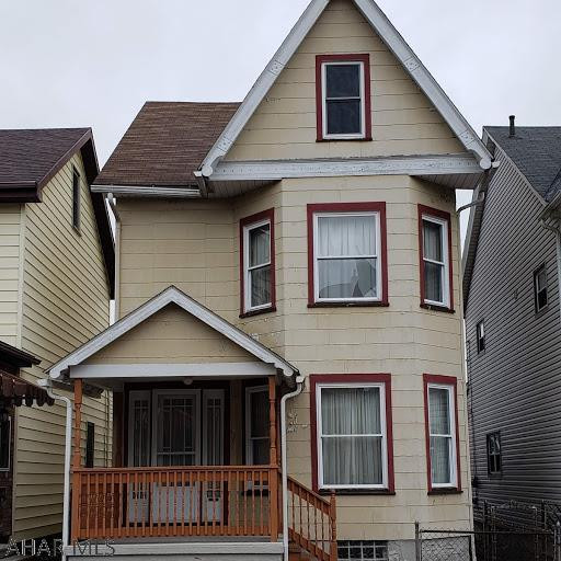 This classic 3 bedroom, 2 bath home is spacious and has tons of charm. The mahogany woodwork and built-ins have been meticulously maintained. The kitchen has been updated and appliances are included. The fenced yard leads to a one car garage with garage door opener. The bedrooms are large and have painted hard wood floors.  Mechanics are newer and basement is painted and dry.   Don't miss this special home!