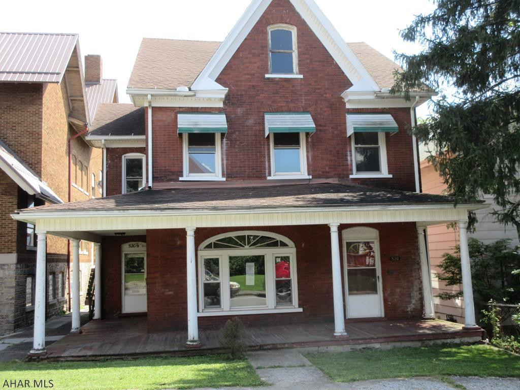 Juniata 2.5 story brick two unit apartment building could easily be converted back to single family residence. Live in one unit and rent out the other one to help pay your mortgage! Separate gas, electric and water/sewer meters. This home is HUGE and needs some work throughout, but loads of potential near PSU Altoona. Features 2 car detached garage, large front porch and rear deck. Property sold AS-IS. Seller will make no repairs. Offers must be submitted through HUD approved broker. Buyer pays both transfer taxes. Equal Housing Opportunity.