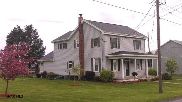 Four bedrooms, 3 1/2 baths, sits on 1.33 acres with beautiful view of the Cove. Thermal windows,CA, newer detached two car garage, first floor bedroom and bath, super layout open and bright.Additional 1.07 acres with large barn and outbuilding currently used as a bakery can be purchased with existing house and garage (TAX ID 17-7 parcel 17D) for a total of $253,500.Seller would like the right to rent back the bakery for a 1 year lease.  Property qualifies for Rural Housing Loan