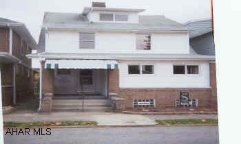 3BR newer kitchen & bath. Finished attic. Dining room, foyer. Hardwood floors. 2 car garage. Newer furnace, shingle roof. Porches & garage roofs are 3 yrs. old.