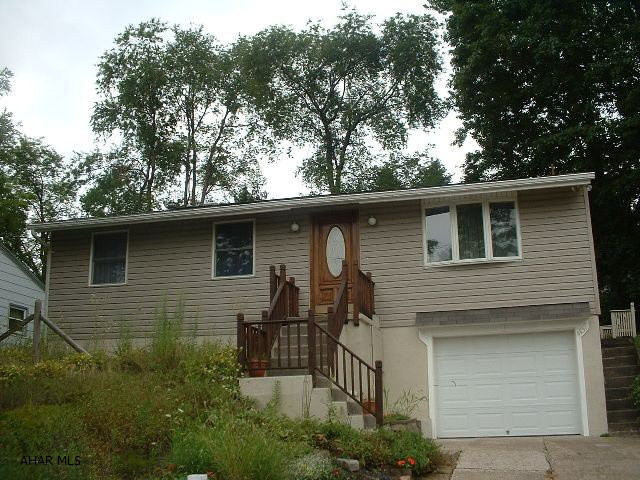 Stunning and Spotless! Spacious ranch with all kinds of extras. Beautiful finished basement with seperate laundry room. Open kitchen, breathtaking family room w/hardwood floors and vaulted ceiling. So much bigger than it looks from the outside! Don't just drive by this one!