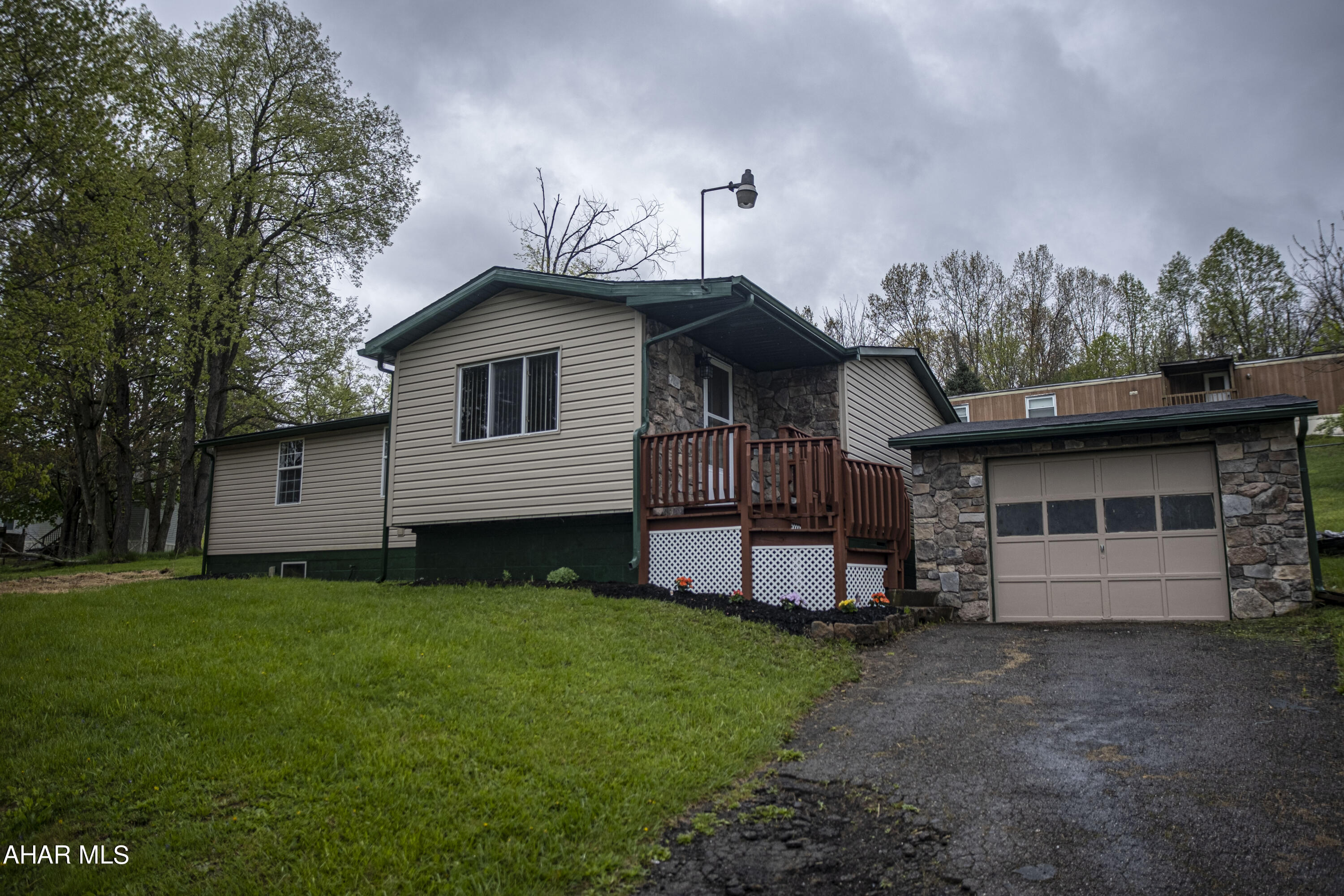 Newly Updated 3 bedroom 1 full bath home with a large fenced in back yard with a covered deck and hot tub. Open concept kitchen and dining room, large living room amd a bonus room. Schedule your tour.