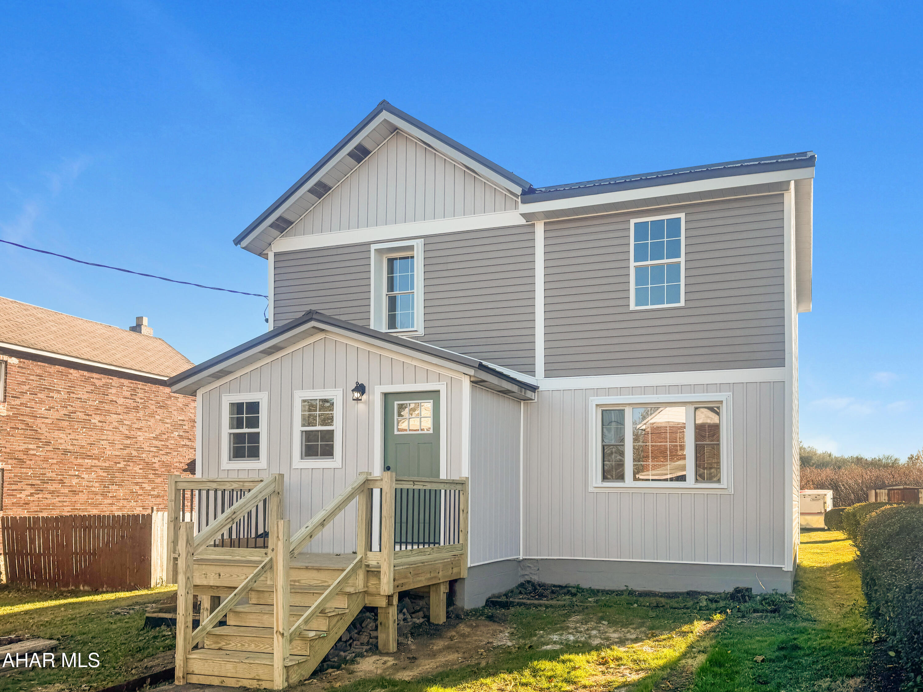 Welcome to 508 Cambria Avenue, a stunning, fully renovated residence in the Central Cambria School District, where modern luxury meets timeless charm. Every inch of this home has been meticulously reimagined w/ high-end craftsmanship & premium finishes - including new windows, roof, plumbing, wiring, insulation, framing & much more. The main level showcases a stylish mudroom, a designer half bath, & a custom gourmet kitchen w/ quartz countertops, an oversized island, & sleek cabinetry that flows seamlessly into the spacious living & dining areas, highlighted by an exposed chimney & wood beams for added character. Upstairs, discover two generous bedrooms, a beautifully appointed full bath, & an extraordinary primary suite featuring soaring cathedral ceilings, exposed wood beams, a walk-in closet, & a spa-inspired ensuite. With a large yard, off-street parking, & ample storage in the clean, unfinished basement, this home offers both elegance & practicality. Schedule your private tour today & experience luxury living at its finest.