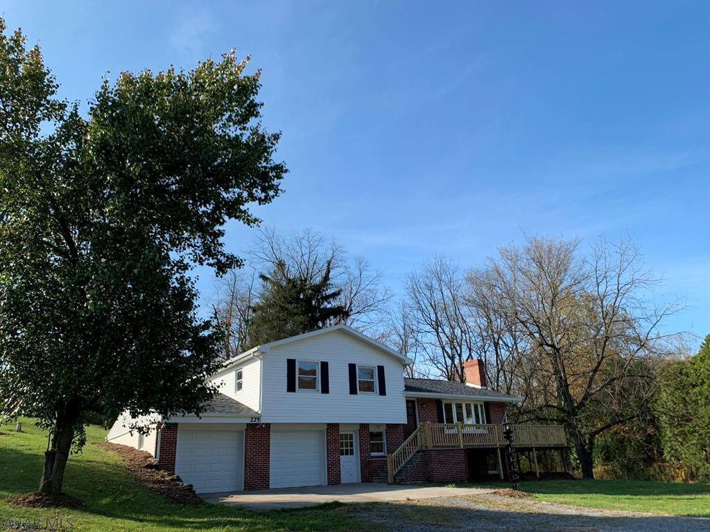 2 private acres in sought-after Snake Spring Twp (BD schools) with a 3 bdrm, 1.5 bath professionally and completely remodeled!  Creek view, two fireplaces, central air, large kitchen/living areas, attached garage, 3 levels of living, wrap deck! Between Bedford and Everett, close to all amenities and highways!