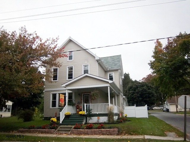 This is the home you've waited for! Located on a corner lot with an inviting wrap around front porch. Completely updated from top to bottom. Could have two-master BRs one on the 1st floor where the family room is now located and the other on the second floor each one having its own  bath.  There are two more BRs and an office/ bonus room on the second floor and an additional bath.  Theres also an unfinished attic with tons of potential. Outside you have a six-foot vinyl fence and an oversized 3-car garage with a pull down staircase for added storage. You better hurry because this home is not going to last.