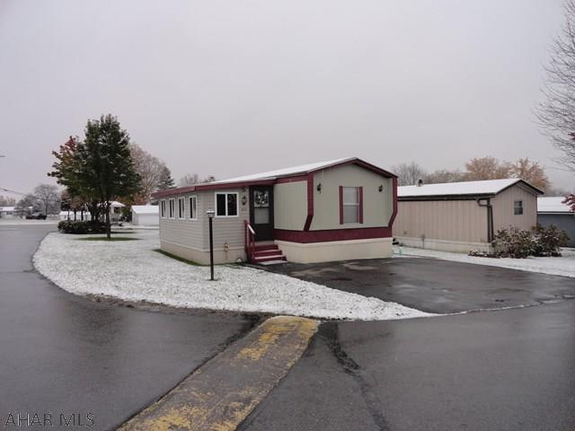 Spacious 2 bedroom, 2 bath with newer kitchen cabinets and counter tops, all appliances, hardwood floors throughout, finished Florida room for entertaining or extra living space, patio area and shed included. Well cared for and A MUST SEE!
