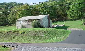 Well maintained 2 bedroom ranch home situated on 1acre in Bedford School District.  Property has new windows and new carpet in the bedrooms as well as a one car garage.Well maintained 2 bedroom ranch home situated on 1acre in Bedford School District.  P Well maintained 2 bedroom ranch home situated on 1acre in Bedford School District.  Property has new windows and new carpet in the bedrooms as well as a one car garage.