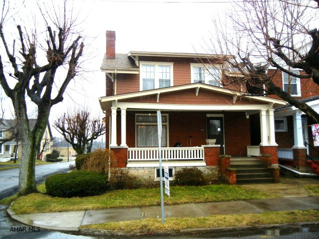 Lots of  curb appeal. Brick home in Eldorado. Living rm with fireplace, formal dining rm, panelled den, breakfast nook off kitchen. Large 2 car detached garage. Enclosed porch offmaster. Large bath. Charming front porch.