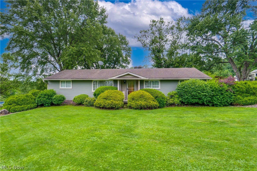 This lovely ranch has been so well cared for and offers 1,375 square feet plus a partially finished basement for even more living space with walk-up access to the family room. The home features 3 bedrooms/2 full baths and both front and side living room areas. Enjoy hardwood flooring in the bedrooms and front living room plus a nicely sized eat-in kitchen with all appliances. The dinette area has sliding doors to the back patio and lush landscaping. The lower level has been newly renovated with a rec room area, luxury vinyl flooring, an updated full bath, plus ample storage space. The rural setting is beautiful with fruit trees and a covered carport. Also, make sure to check out the long list of major updates that have been done to the home. The home is move-in ready condition for the new owner. Don't hesitate on your chance to own this fantastic property! The unique opportunity is that you can also purchase the mobile home at 12710 Lisbon which is on a separate parcel that sits on a .80 acre lot. This would be fantastic to use as a rental (approx $750/mo), for in-laws, or out of town guests. Buy as a package or separately. Both homes have their own separate​​‌​​​​‌​‌​​​‌‌​​​‌‌‌​​‌​​‌‌​​​​ parcel.