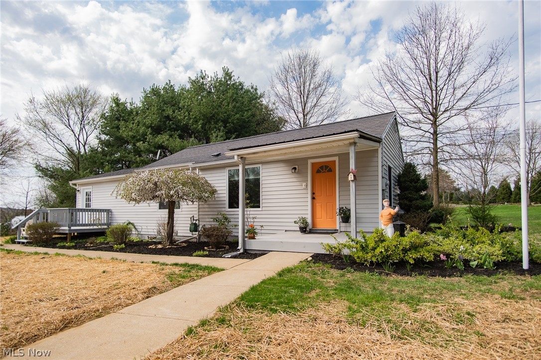 This 2 bedroom, 1 bath ranch is a must see! Don't let the size fool you, this home has a lot to offer. Completely remodeled following the latest trends and styles, with plenty of natural light and an open floor concept this home is perfect for relaxing or entertaining. It features new windows and doors, new septic and landscaping, new central AC, newer high efficiency furnace, completely remodeled spacious bathroom with both bathtub and walk in shower, all new flooring and paint throughout, new kitchen with new appliances, all new custom lighting, new garage floor, just to name a few. The spacious yard with plenty of evergreen trees and foliage provides excellent privacy. A large 2 car garage with a new concrete floor makes for a perfect workshop, or storage area, while the newly graveled driveway provides plenty of parking space. Conveniently located within minutes of major roads and highways, this home is an ideal place to get away from the busy city life, meanwhile never being too f