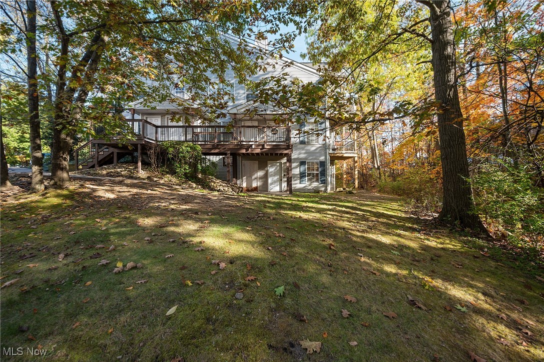 Move-in ready ranch-style condo surrounded by scenic wooded views. Enjoy the ease of one-floor, low-maintenance living in the parklike Stoney Run community, featuring a clubhouse with a party room and billiards area, fitness room with shower and locker facilities, and an outdoor patio with grilling area. The freshly painted first floor unit offers a spacious living and dining room combination with sliders leading to a covered patio with an in-ground grill that is grandfathered in. The kitchen features quartz countertops and all appliances included. The large bedroom offers a walk-in closet and an ensuite bath. In unit stackable washer and dryer for added convenience. Recent updates include: Professionally painted kitchen and bath cabinets (2026), Refrigerator (2025), flooring in living room, hall and bedroom (2023). INCLUDED are ALL kitchen appliances, washer/dryer, window treatments, and a 1-year home warranty. The low monthly HOA fee includes 1 garage parking spot, water, sewer, trash, landscaping and snow removal. Conveniently located near I-77, I-80, OH-82, shopping, restaurants, schools, and other local attractions.