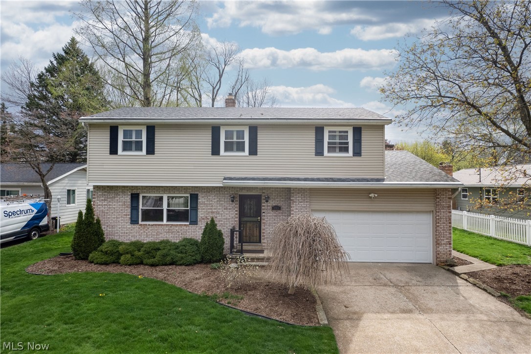 Spacious 4 bedroom, 3 bath colonial conveniently located in the heart of Fairlawn, just minutes from shopping and dining! This well maintained home features a flowing first floor layout with a large updated kitchen offering granite countertops, stainless steel appliances, an abundant of cabinetry, and multiple pantries for exceptional storage. The living room showcases beautiful hardwood floors, while the huge family room is perfect for entertaining with a gas fireplace, built in cabinetry, wet bar, and double Anderson sliding glass doors leading to the back patio. The main level also includes an eat in dining area, crown molding, and a half bath. Upstairs, you will find four generously sized bedrooms, two full baths, a laundry area, a whole house fan, and gorgeous high-end wooden shutters. The finished lower level adds additional living space along with extra storage. Outside, enjoy the vinyl fenced in backyard, storage shed, and a large patio area. Additional updates include a tank-less water heater, added insulation, a new front railing, and security lighting. What a fantastic opportunity in a prime location. Call today to schedule your showing.