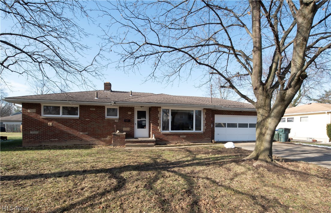 This charming brick ranch in the Falls is just waiting for your finishing touches.  You're greeted by a spacious and well-lit living room with large picture window and newer carpet (2016).  The eat-in kitchen features plenty of storage with beautiful, laminate floors and newer counter tops (2016).  All three bedrooms boast gorgeous hardwood floors and the full basement is a work in progress.  It's framed, plumbed, and drywalled for another full bath with shower (stall is installed) and 3 additional rooms.  Your winter project awaits!  Other updates include new footer drains 2013, new roof and glass block windows in 2009, HWT in 2016.  Just minutes to route 8 and shopping/restaurants on Graham Road.  Schedule your private showing today!