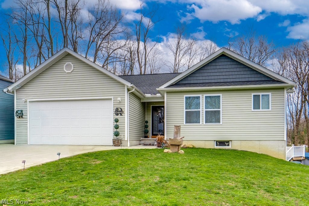 Welcome to this stunning 2018-built ranch home offering over 2,800 square feet of beautifully designed living space, perfectly situated on a cul-de-sac. With 6 bedrooms and 3 full baths, this home provides the space and flexibility you’ve been looking for. The inviting entry opens into a bright and airy living area and eat-in kitchen, highlighted by a vaulted ceiling that creates a warm farmhouse-chic feel—perfect for everyday living and entertaining alike. The kitchen is a true centerpiece, featuring white cabinetry, granite countertops, recessed lighting, an abundance of windows for natural light, and a large island ideal for meal prep and additional seating. The living room offers a cozy fireplace, perfect for enjoying Ohio’s changing seasons. The main floor owner’s suite provides a relaxing retreat with dual sinks, a soaking tub, and a separate stand-up shower. Two additional generously sized bedrooms, a full bath, and a convenient first-floor laundry room with a charming barn door complete the main level. The finished lower level expands your living space even further, featuring a spacious bedroom with a custom walk-in closet, two additional bedrooms, a full bath with double vanities, and a large recreation area with walkout access to the backyard. This level offers endless possibilities—create a home theater, office, gym, or crafting space to fit your lifestyle. Outdoors enjoy the deck overlooking a play area, leading to a swimming pool and a large shed for extra storage. This home truly has it all—space, style, and functionality—ready for you to move in and make it your own.