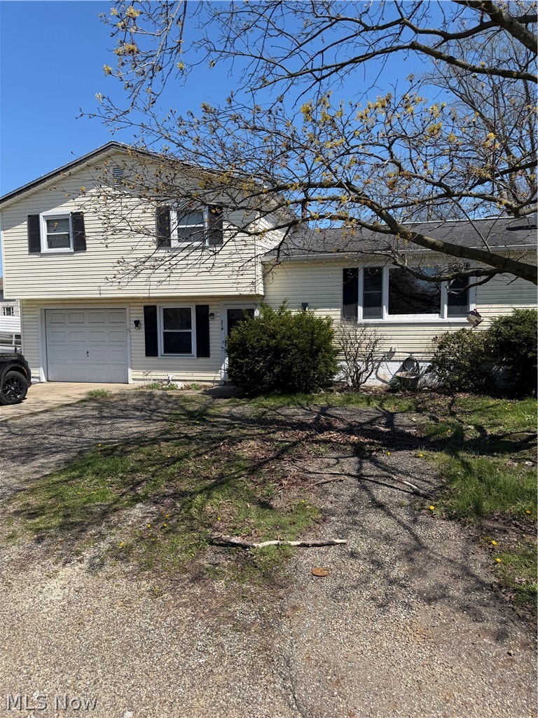 Excellent investment opportunity in Perry Local Schools! This split level can easily be brought back to life. This sits on a large lot, close to everything but just far enough away. Property features three bedrooms, 1.5 baths, generous kitchen and living area. This home could be the perfect starter home or investment property. House is being sold AS IS.