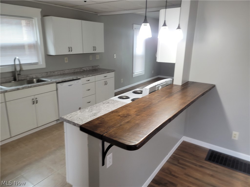 Move right in, unpack, and enjoy the peace of mind that comes with this beautifully renovated 2-bedroom, 2-full-bath home! Completely remodeled from top to bottom, this home blends modern updates with everyday comfort. The fully applianced kitchen flows into a formal dining room,  and inviting living room, First Floor Full Bathroom, while the convenient second-floor laundry adds functionality to the well-designed layout. Currently occupied by a long-term tenant on a month-to-month lease paying $1,100 per month, this property offers excellent flexibility. Continue generating rental income from day one, or take advantage of the month-to-month lease to make this beautifully updated home your own. Whether you're an investor or an owner-occupant, this move-in-ready property is an opportunity you won't want to miss!