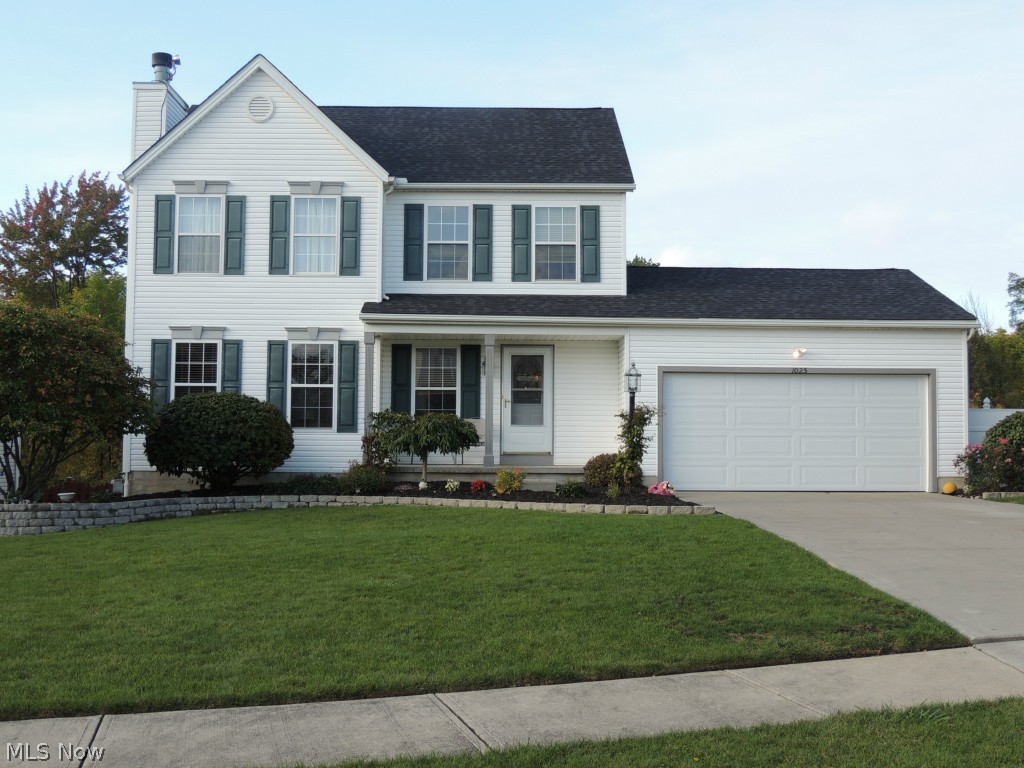 This beautiful colonial on a cul-de-sac lot with wooded backyard view offers a large great room with a gas fire place and newer neutral carpet. Newer updated eat in kitchen with oak cabinets, ceramic tile flooring, back splash and granite counter tops. All Whirlpool kitchen appliances three years young.  Crown molding in the great room and kitchen add warmth and style to this home. In the freshly painted master bedroom you will find a vaulted ceiling with ceiling fan along with a walk in closet and gorgeous master bath with garden tub.  The full finished, walk out basement offers a wonderful spacious area with a wet bar for your entertaining pleasure.  Off of the kitchen walk through sliding glass doors to a two tier large composite deck that offers a wonderful view. This lovely home is finished off with a vinyl fenced in back yard offering a newer above ground pool for those long hot summer days.  New roof and overhead garage door, July 2014. New air conditioner, furnace, and heat pum