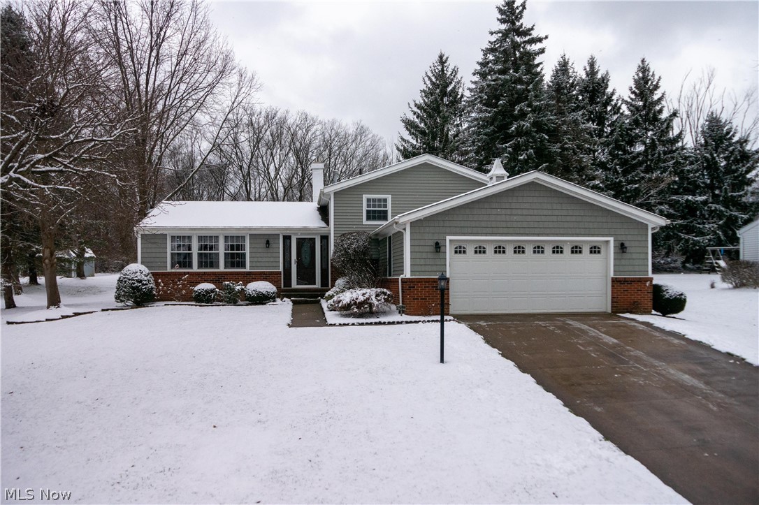 Buy your next home in time for the holidays!  This is the home you have been waiting for!  Four level split is meticulously maintained and shows pride of ownership.  Spacious living and dining rooms lead you through sliders to the stylish screened in porch, which is vaulted and has 2 skylights!  You will spend a lot of time in this room for 3 seasons and enjoy the wildlife and private backyard.   Beautiful eat in kitchen with hardwood floors features an awesome pantry with solid wood doors and nice updates to include granite countertops and no touch faucet (2017), stone backsplash (2018) and all appliances (2015). The second level features 3 good sized bedrooms and a full updated bath complete with a 6' Kohler Air Bubble Tub and double vanity.    The lower level features a spacious recreation room with gas fireplace, which was added in 2014, another room - perfect for whatever your heart desires and a full bath with walk-in shower.  Just a few more steps and you will find a spacious of