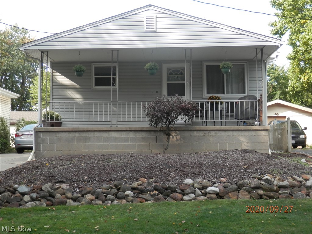 Move Right In!!  Cute 3 Bedroom Ranch featuring a Relaxing Front Porch, Ideal 1 1/2 Car Garage with Concrete Drive, a Friendly Eat-In Kitchen with Oak Cabinetry, Central Air, & an Extra Partially Finished Room in the Lower Level that would make a nice Rec Room or maybe an Extra Needed 4th Bedroom.