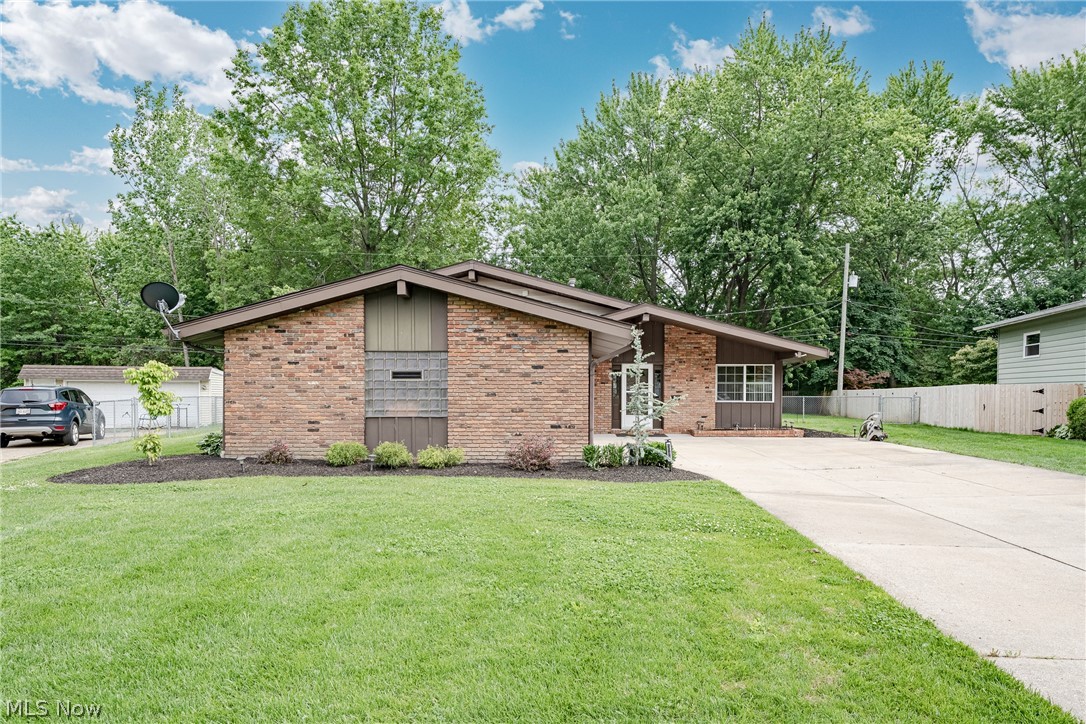 Welcome to 23823 Beaumont Dr, North Olmsted – A Move-In Ready Home with Space for the Whole Family!

Nestled on a quiet, tree-lined street, this beautifully maintained split-level home offers the perfect blend of comfort, functionality, and modern updates. From the moment you step inside, you'll be greeted by a welcoming foyer that opens to a bright and airy living and dining area featuring a vaulted ceiling and updated luxury vinyl plank flooring, creating an inviting space for both everyday living and entertaining.

The well-appointed kitchen is designed to impress, offering granite countertops, a stylish tile backsplash, stainless steel appliances, and abundant cabinet space for all your storage needs. Upstairs, you'll find three comfortable bedrooms, each featuring hardwood flooring, along with an updated full bathroom complete with a double vanity.

The lower level provides exceptional flexibility for today's lifestyle, featuring a spacious family room perfect for movie nights, game days, or gatherings with family and friends. This level also includes a fourth bedroom, an updated full bathroom, and a convenient laundry/utility room, making it ideal for guests, a home office, or multi-generational living.

Step outside to discover a huge backyard retreat with a patio, storage shed, and plenty of room for children, pets, gardening, or outdoor entertaining. Surrounded by mature trees and offering a wonderful sense of privacy, this outdoor space is ready to be enjoyed all year long.

Lovely, well cared for, and truly move-in ready, this North Olmsted gem is ready to welcome its next family home.