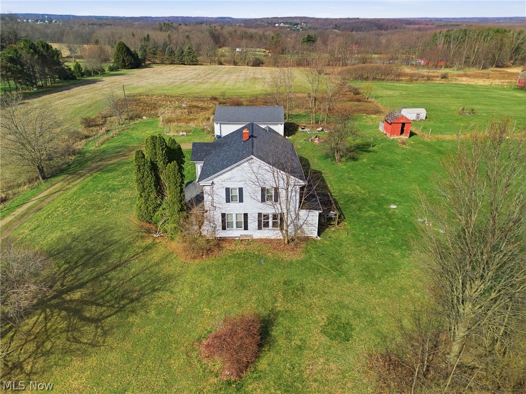 Calling all Cash Investors!!! Looking for a rewarding spring or summer project? This charming farmhouse is ready for its next chapter and waiting for someone to restore it to its former glory! With 6 bedrooms and nearly 3,000 square feet of living space, the possibilities here are truly endless. Situated on just under an acre in the Southeast Local School District, this property offers the space and setting to bring your vision to life. The open kitchen and flexible floor plan provide a great starting point for creating your dream home, while the first floor features a full bathroom and multiple bedrooms for added convenience. Upstairs, you’ll find even more bedrooms, offering plenty of room to reimagine and customize. Outside, a 4-car detached garage with concrete flooring and electric adds incredible value—perfect for storage, hobbies, or workshop space. Priced to sell and full of potential, this is an opportunity you won’t want to miss. Bring your ideas, roll up your sleeves, and make this farmhouse shine once again!