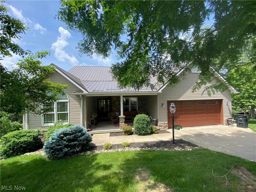 Move right in to this beautiful open floor plan home with complete finished lower level walkout to an inviting pool area with shelter house and various decks.
Feel like your on vacation with the wide spread view. Walk into a 6x22 Foyer that lead to an open floor plan with great room (Gas log fireplace), dining area,
Kitchen with breakfast bar, & office area with door leading to back deck overlooking the back yard and 20x40 salt water pool and entertainment area. Formal dining room , master suite with full bath and separate shower and walk-in closet, laundry room on first floor, additional 2 bedrooms and another full bath. The flooring on the first floor consists of Brazilian Cherry wood, and carpet. The lower level walkout recroom with wood burning fireplace is perfect and large enough to host a large crowd for just about any function. Also an exercise room room that can also be media room.  Possible 4th bedroom could be available with just some finishing. there is a full bath in lower level. Roof was put on in 2020, Geothermal heating 2021 with 10 yr Warranty. Move-in Ready... Don't miss out.