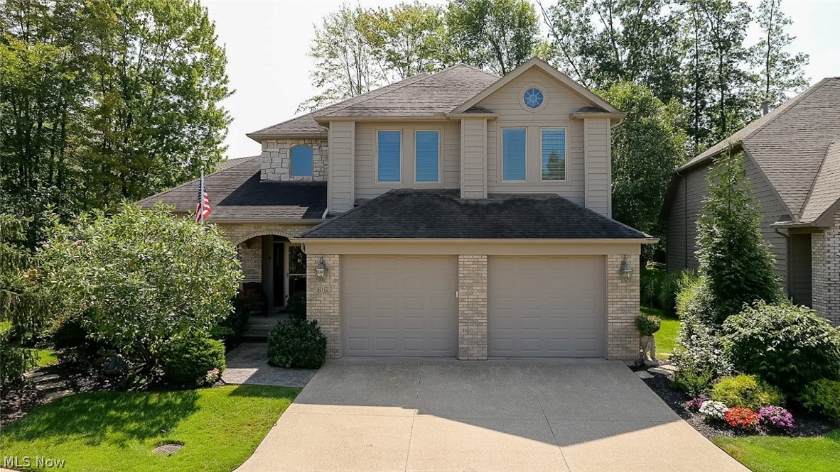 Beautiful cluster home in Barrington Estates has 3876 square feet of finished space.  This manor home offers a spacious first floor master suite with private wooded views from the attached 4 seasons room, spacious custom closet and master bathroom.  The oversized kitchen offers granite counter tops, newer stainless steal appliances, large island with prep sink, custom built Kraftmaid cabinets, and bar seating.  The eat in kitchen is spacious and overlooks the private wooded lot.  The Great room features vaulted ceilings, a lovely gas fireplace and access to the 4 seasons room.  The first floor also offers a nice sized dinning room and laundry room.  The second floor has two spacious bedrooms with Jack and Jill bathroom.  There is also a large office space complete with built in shelving. The lower level of the property is mostly finished but still have plenty of room for storage.  The finished space has a great bar area complete microwave, convention oven with sink, and dishwasher.  Th