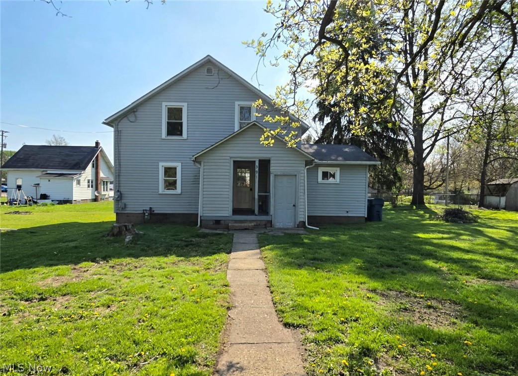 Cozy home in desirable Kent with great schools and everyday conveniences nearby. This quaint charmer offers a full basement with walk-out access, adding flexible living and storage space. The interior has been freshly painted, including the basement and basement floors. The kitchen breakfast nook counter has been replaced and left unstained, giving the new owner the opportunity to choose the finish they love. Previous tenants relocated the washer and dryer to a main-floor bedroom, but they could easily be moved back to the basement to reclaim that bedroom space. This cute home sits on a large double parcel with lots of space for your kids to play! All appliances stay.  Don't miss the gorgeous magnolia tree in the front yard!